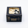 Scented candle in a decorative box with 'Soul Sticks' branding on a white background